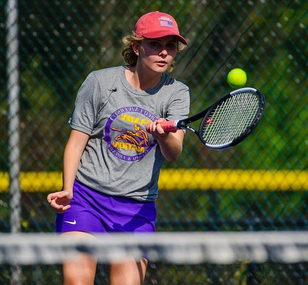 Talulla playing tennis